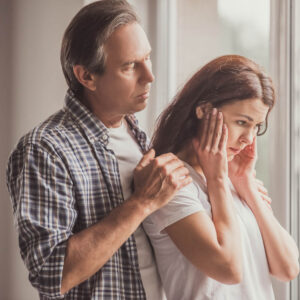 Couple at home dealing with sadness 1000