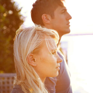 Couple looking off into the distance thinking through issues that need to be worked through 1000
