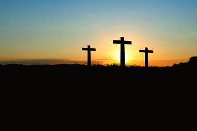 Crosses on a hill representing the cross of Jesus