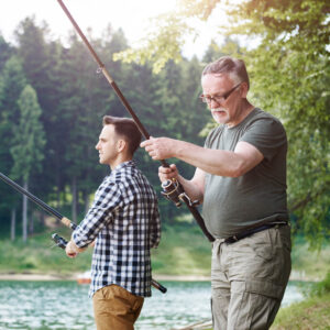 Father and son fishing together and showing compassion 1000