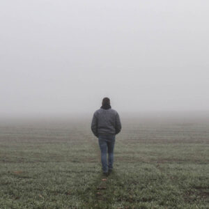 Man walking into the fog feeling very alone but need support from Wyndhurst Counseling and Wellness 1000