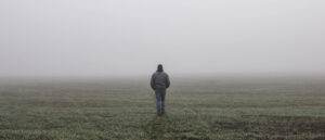 Man walking into the fog feeling very alone but need support from Wyndhurst Counseling and Wellness 2560