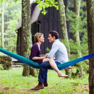 Couple sitting on hammock talking after a counseling intensive with Chuck Rodgers at Wyndhurst Counseling and Wellness in Lynchburg Va 1400