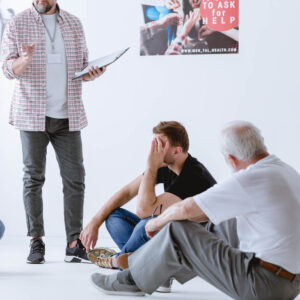 Men Sitting in circle with group counseling at Wyndhurst Counseling and Wellness 1000
