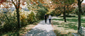 Men walking together sharing life 2560